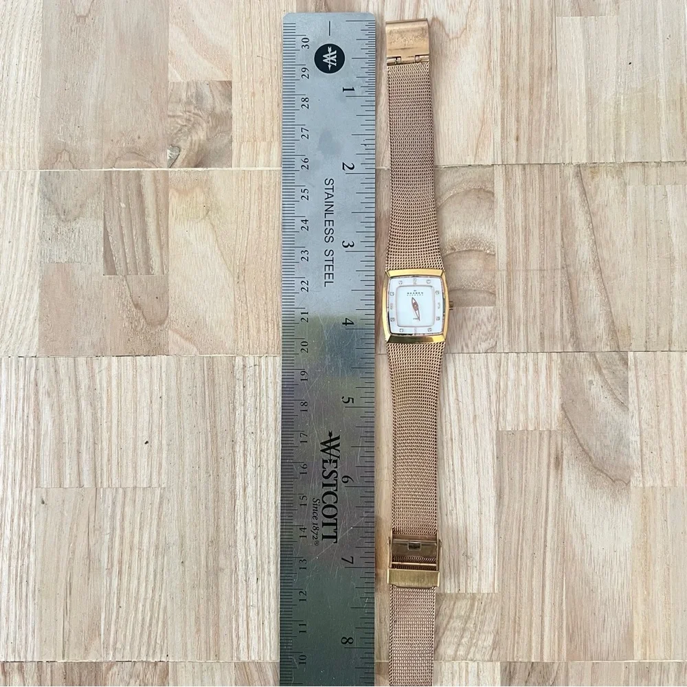 Skagen Denmark ladies rectangular rose gold tone dress watch NEW BATTERY